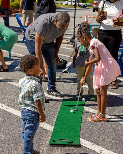 Kids playing Minigolf at Snellville
