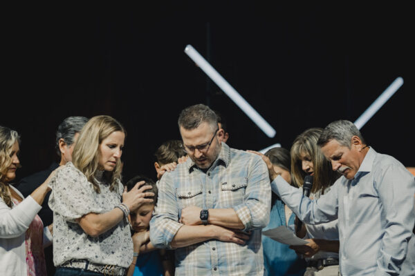 Founding Pastor Kevin prays over new Senior Pastor, Jason Berry